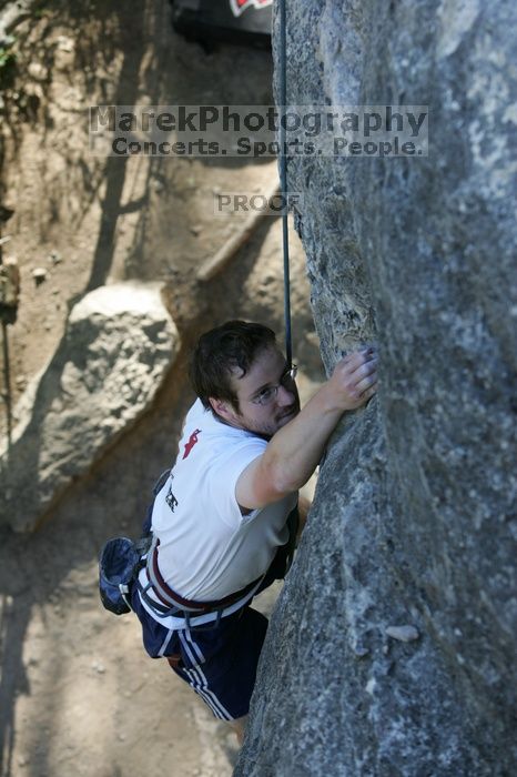 Me top roping Lick the Window (5.10c), shot by Javier Morales from the top of Ack! (5.11b, but using the crack for the start instead) that I top roped up with my camera on my back.  It was another long day of rock climbing at Seismic Wall on Austin's Barton Creek Greenbelt, Sunday, April 5, 2009.

Filename: SRM_20090405_17265188.jpg
Aperture: f/4.5
Shutter Speed: 1/320
Body: Canon EOS-1D Mark II
Lens: Canon EF 80-200mm f/2.8 L