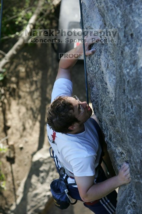 Me top roping Lick the Window (5.10c), shot by Javier Morales from the top of Ack! (5.11b, but using the crack for the start instead) that I top roped up with my camera on my back.  It was another long day of rock climbing at Seismic Wall on Austin's Barton Creek Greenbelt, Sunday, April 5, 2009.

Filename: SRM_20090405_17275708.jpg
Aperture: f/5.0
Shutter Speed: 1/320
Body: Canon EOS-1D Mark II
Lens: Canon EF 80-200mm f/2.8 L