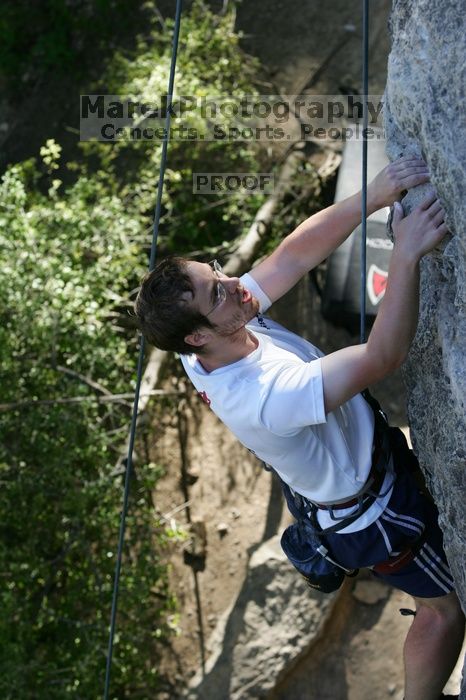 Me top roping Lick the Window (5.10c), shot by Javier Morales from the top of Ack! (5.11b, but using the crack for the start instead) that I top roped up with my camera on my back.  It was another long day of rock climbing at Seismic Wall on Austin's Barton Creek Greenbelt, Sunday, April 5, 2009.

Filename: SRM_20090405_17280416.jpg
Aperture: f/5.0
Shutter Speed: 1/320
Body: Canon EOS-1D Mark II
Lens: Canon EF 80-200mm f/2.8 L