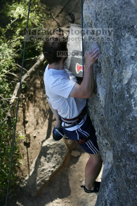 Me top roping Lick the Window (5.10c), shot by Javier Morales from the top of Ack! (5.11b, but using the crack for the start instead) that I top roped up with my camera on my back.  It was another long day of rock climbing at Seismic Wall on Austin's Barton Creek Greenbelt, Sunday, April 5, 2009.

Filename: SRM_20090405_17281422.jpg
Aperture: f/5.0
Shutter Speed: 1/320
Body: Canon EOS-1D Mark II
Lens: Canon EF 80-200mm f/2.8 L