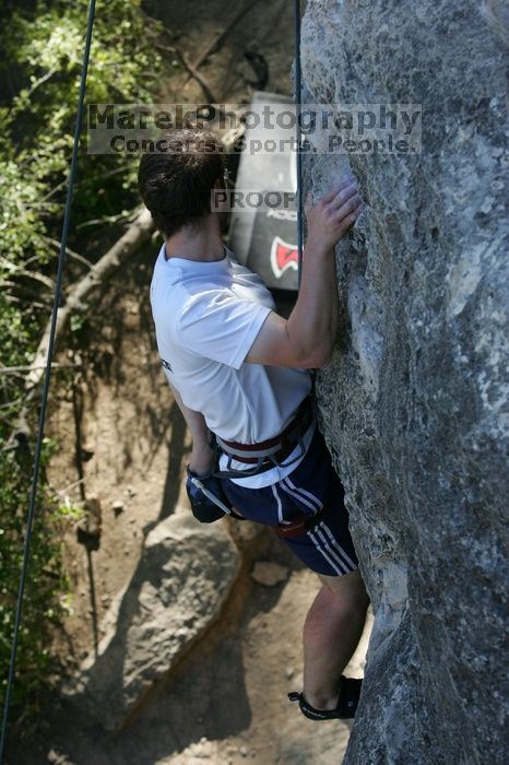 Me top roping Lick the Window (5.10c), shot by Javier Morales from the top of Ack! (5.11b, but using the crack for the start instead) that I top roped up with my camera on my back.  It was another long day of rock climbing at Seismic Wall on Austin's Barton Creek Greenbelt, Sunday, April 5, 2009.

Filename: SRM_20090405_17281523.jpg
Aperture: f/5.0
Shutter Speed: 1/320
Body: Canon EOS-1D Mark II
Lens: Canon EF 80-200mm f/2.8 L