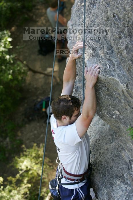 Me top roping Lick the Window (5.10c), shot by Javier Morales from the top of Ack! (5.11b, but using the crack for the start instead) that I top roped up with my camera on my back.  It was another long day of rock climbing at Seismic Wall on Austin's Barton Creek Greenbelt, Sunday, April 5, 2009.

Filename: SRM_20090405_17284637.jpg
Aperture: f/4.0
Shutter Speed: 1/320
Body: Canon EOS-1D Mark II
Lens: Canon EF 80-200mm f/2.8 L