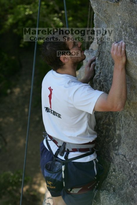 Me top roping Lick the Window (5.10c), shot by Javier Morales from the top of Ack! (5.11b, but using the crack for the start instead) that I top roped up with my camera on my back.  It was another long day of rock climbing at Seismic Wall on Austin's Barton Creek Greenbelt, Sunday, April 5, 2009.

Filename: SRM_20090405_17291557.jpg
Aperture: f/5.6
Shutter Speed: 1/320
Body: Canon EOS-1D Mark II
Lens: Canon EF 80-200mm f/2.8 L