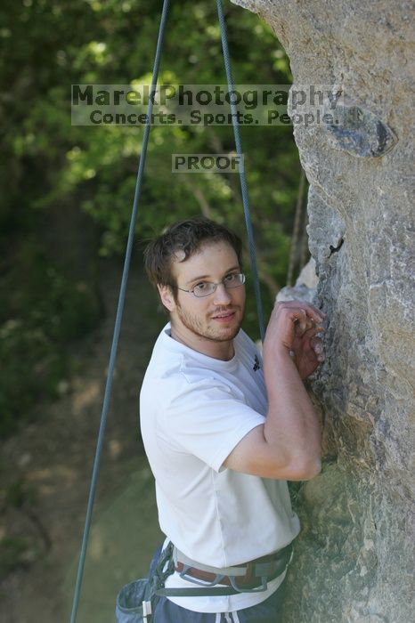 Me top roping Lick the Window (5.10c), shot by Javier Morales from the top of Ack! (5.11b, but using the crack for the start instead) that I top roped up with my camera on my back.  It was another long day of rock climbing at Seismic Wall on Austin's Barton Creek Greenbelt, Sunday, April 5, 2009.

Filename: SRM_20090405_17293661.jpg
Aperture: f/4.5
Shutter Speed: 1/320
Body: Canon EOS-1D Mark II
Lens: Canon EF 80-200mm f/2.8 L