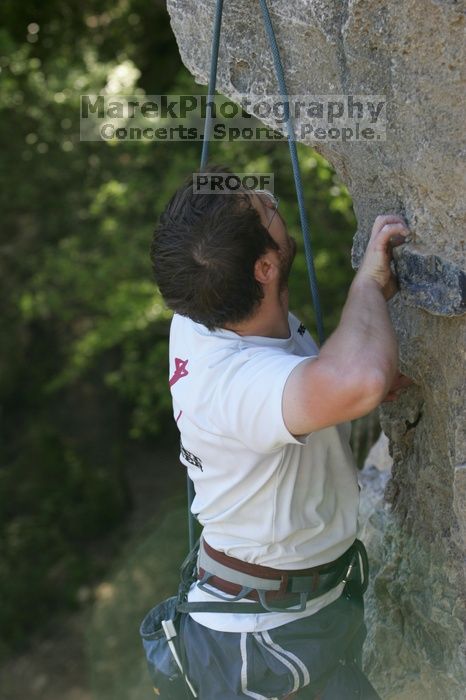 Me top roping Lick the Window (5.10c), shot by Javier Morales from the top of Ack! (5.11b, but using the crack for the start instead) that I top roped up with my camera on my back.  It was another long day of rock climbing at Seismic Wall on Austin's Barton Creek Greenbelt, Sunday, April 5, 2009.

Filename: SRM_20090405_17294666.jpg
Aperture: f/5.0
Shutter Speed: 1/320
Body: Canon EOS-1D Mark II
Lens: Canon EF 80-200mm f/2.8 L