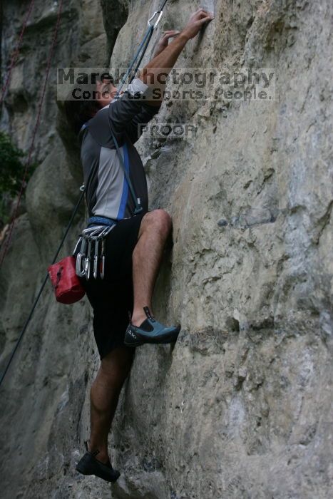 Javier Morales leading up Angel of Poets (5.10a).  It was another long day of rock climbing at Seismic Wall on Austin's Barton Creek Greenbelt, Saturday, April 11, 2009.

Filename: SRM_20090411_12355007.JPG
Aperture: f/5.0
Shutter Speed: 1/250
Body: Canon EOS-1D Mark II
Lens: Canon EF 80-200mm f/2.8 L