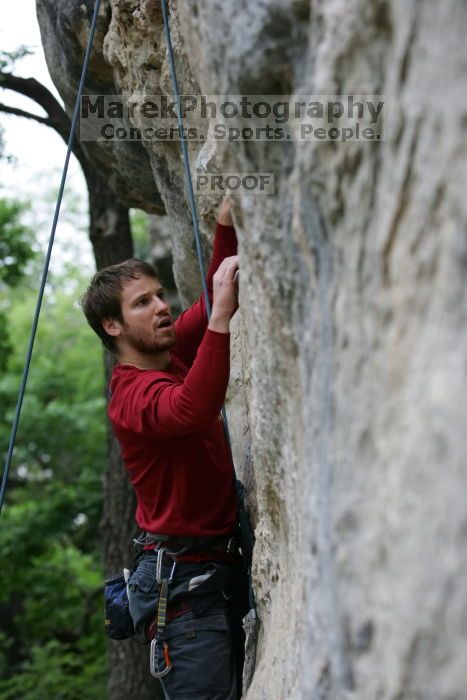 Me top rope climbing Angel of Poets (5.10a), taken by Andrew Dreher.  It was another long day of rock climbing at Seismic Wall on Austin's Barton Creek Greenbelt, Saturday, April 11, 2009.

Filename: SRM_20090411_13053529.JPG
Aperture: f/4.0
Shutter Speed: 1/200
Body: Canon EOS-1D Mark II
Lens: Canon EF 80-200mm f/2.8 L