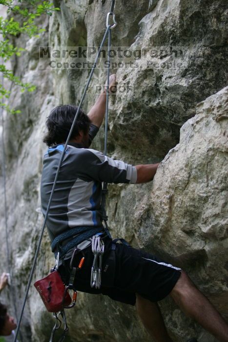 Javier Morales lead climbing Nose Print on the Windshield (5.11c).  It was another long day of rock climbing at Seismic Wall on Austin's Barton Creek Greenbelt, Saturday, April 11, 2009.

Filename: SRM_20090411_13215640.JPG
Aperture: f/2.8
Shutter Speed: 1/250
Body: Canon EOS-1D Mark II
Lens: Canon EF 80-200mm f/2.8 L