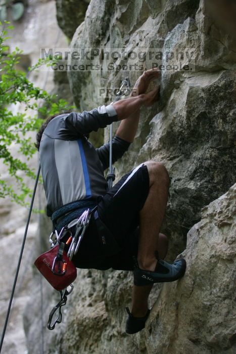 Javier Morales lead climbing Nose Print on the Windshield (5.11c).  It was another long day of rock climbing at Seismic Wall on Austin's Barton Creek Greenbelt, Saturday, April 11, 2009.

Filename: SRM_20090411_13221043.JPG
Aperture: f/2.8
Shutter Speed: 1/400
Body: Canon EOS-1D Mark II
Lens: Canon EF 80-200mm f/2.8 L