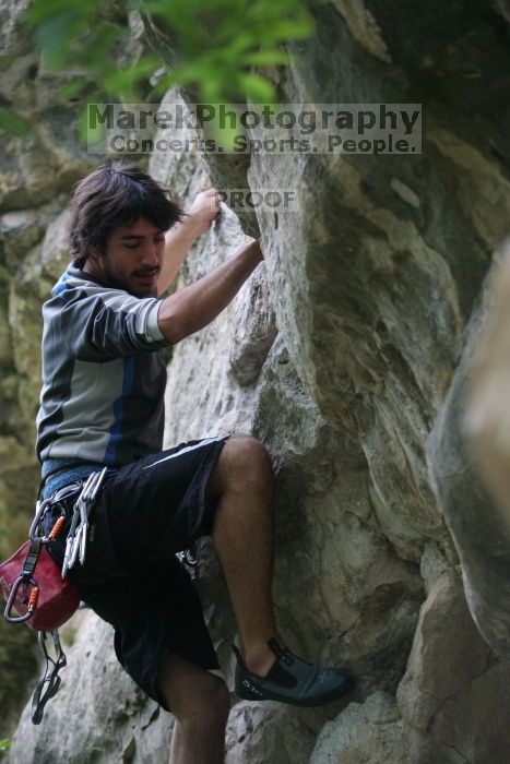 Javier Morales lead climbing Nose Print on the Windshield (5.11c).  It was another long day of rock climbing at Seismic Wall on Austin's Barton Creek Greenbelt, Saturday, April 11, 2009.

Filename: SRM_20090411_13231350.JPG
Aperture: f/2.8
Shutter Speed: 1/250
Body: Canon EOS-1D Mark II
Lens: Canon EF 80-200mm f/2.8 L