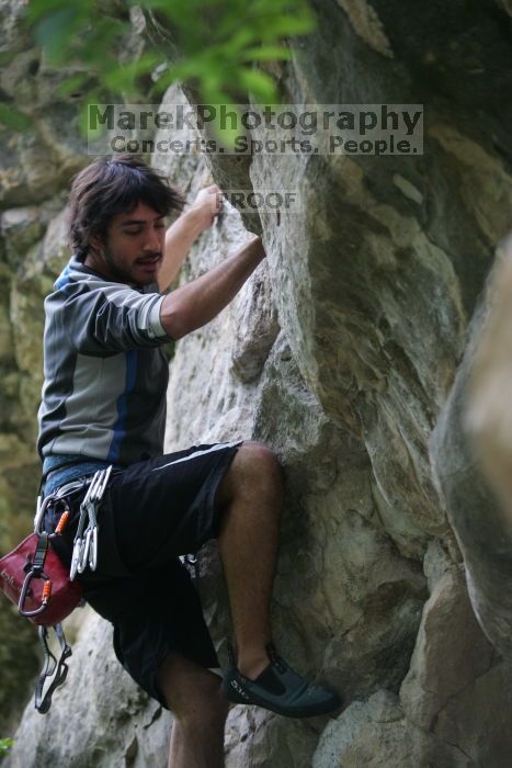 Javier Morales lead climbing Nose Print on the Windshield (5.11c).  It was another long day of rock climbing at Seismic Wall on Austin's Barton Creek Greenbelt, Saturday, April 11, 2009.

Filename: SRM_20090411_13231351.JPG
Aperture: f/2.8
Shutter Speed: 1/250
Body: Canon EOS-1D Mark II
Lens: Canon EF 80-200mm f/2.8 L