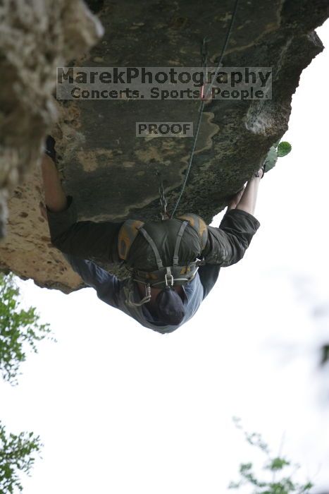 Someone taking a big fall on Cuttin Cards for a Poke (5.12+).  It was another long day of rock climbing at Seismic Wall on Austin's Barton Creek Greenbelt, Saturday, April 11, 2009.

Filename: SRM_20090411_13314655.JPG
Aperture: f/2.8
Shutter Speed: 1/1000
Body: Canon EOS-1D Mark II
Lens: Canon EF 80-200mm f/2.8 L