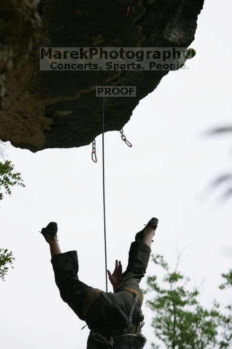 Someone taking a big fall on Cuttin Cards for a Poke (5.12+).  It was another long day of rock climbing at Seismic Wall on Austin's Barton Creek Greenbelt, Saturday, April 11, 2009.

Filename: SRM_20090411_13314959.JPG
Aperture: f/5.0
Shutter Speed: 1/1000
Body: Canon EOS-1D Mark II
Lens: Canon EF 80-200mm f/2.8 L