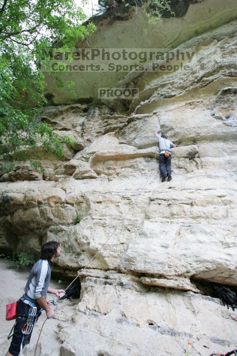 Andrew Dreher lead climbing Magster (5.10a) with Javier Morales belaying.  It was another long day of rock climbing at Seismic Wall on Austin's Barton Creek Greenbelt, Saturday, April 11, 2009.

Filename: SRM_20090411_15302082.JPG
Aperture: f/4.0
Shutter Speed: 1/250
Body: Canon EOS-1D Mark II
Lens: Canon EF 16-35mm f/2.8 L