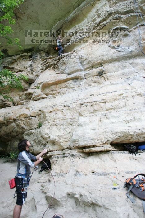 Andrew Dreher lead climbing Magster (5.10a) with Javier Morales belaying.  It was another long day of rock climbing at Seismic Wall on Austin's Barton Creek Greenbelt, Saturday, April 11, 2009.

Filename: SRM_20090411_15325090.JPG
Aperture: f/4.0
Shutter Speed: 1/250
Body: Canon EOS-1D Mark II
Lens: Canon EF 16-35mm f/2.8 L