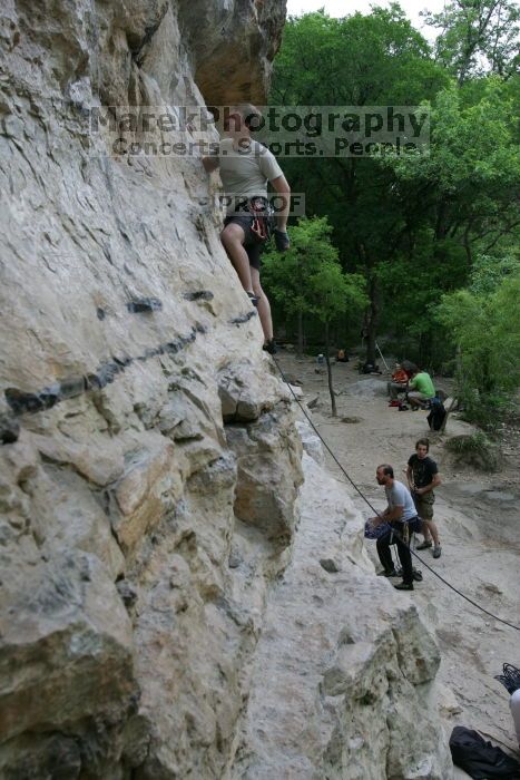 Adam Libson climbing Diving for Rocks (5.10d), shot by Andrew Dreher.  It was another long day of rock climbing at Seismic Wall on Austin's Barton Creek Greenbelt, Saturday, April 11, 2009.

Filename: SRM_20090411_15555226.JPG
Aperture: f/6.3
Shutter Speed: 1/200
Body: Canon EOS-1D Mark II
Lens: Canon EF 16-35mm f/2.8 L