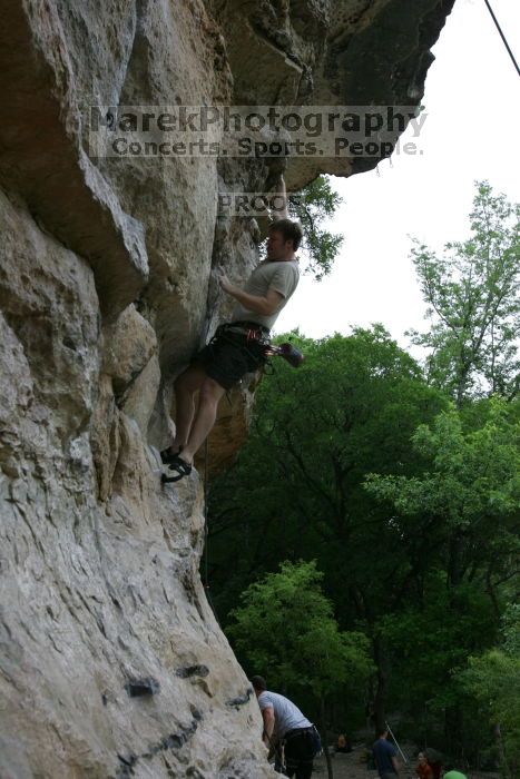 Adam Libson climbing Diving for Rocks (5.10d), shot by Andrew Dreher.  It was another long day of rock climbing at Seismic Wall on Austin's Barton Creek Greenbelt, Saturday, April 11, 2009.

Filename: SRM_20090411_15563731.JPG
Aperture: f/7.1
Shutter Speed: 1/200
Body: Canon EOS-1D Mark II
Lens: Canon EF 16-35mm f/2.8 L