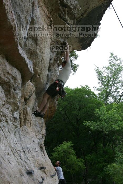 Adam Libson climbing Diving for Rocks (5.10d), shot by Andrew Dreher.  It was another long day of rock climbing at Seismic Wall on Austin's Barton Creek Greenbelt, Saturday, April 11, 2009.

Filename: SRM_20090411_15563932.JPG
Aperture: f/6.3
Shutter Speed: 1/200
Body: Canon EOS-1D Mark II
Lens: Canon EF 16-35mm f/2.8 L