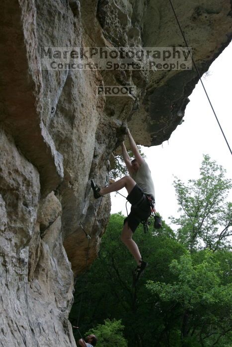 Adam Libson climbing Diving for Rocks (5.10d), shot by Andrew Dreher.  It was another long day of rock climbing at Seismic Wall on Austin's Barton Creek Greenbelt, Saturday, April 11, 2009.

Filename: SRM_20090411_15565333.JPG
Aperture: f/7.1
Shutter Speed: 1/200
Body: Canon EOS-1D Mark II
Lens: Canon EF 16-35mm f/2.8 L