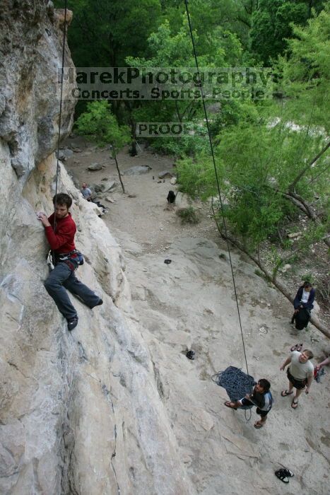 Me top rope climbing Diving for Rocks (5.10d) with Javier Morales belaying, photographed from  the third bolt of Magster (5.10a) by Andrew Dreher.  It was another long day of rock climbing at Seismic Wall on Austin's Barton Creek Greenbelt, Saturday, April 11, 2009.

Filename: SRM_20090411_17035777.JPG
Aperture: f/5.6
Shutter Speed: 1/320
Body: Canon EOS-1D Mark II
Lens: Canon EF 16-35mm f/2.8 L