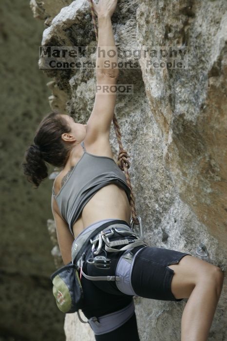 Britta Kakacek, winner of the speed competition with a time of 39.08 seconds.  CTM hosted a speed climbing event at Seismic Wall on Diving for Rocks to benefit the Austin Area Food Bank, Saturday, May 9, 2009.

Filename: SRM_20090509_10355714.jpg
Aperture: f/5.6
Shutter Speed: 1/250
Body: Canon EOS-1D Mark II
Lens: Canon EF 80-200mm f/2.8 L