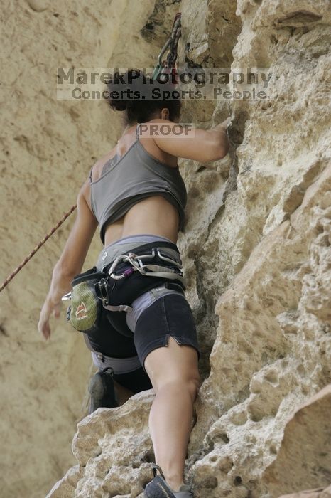 Britta Kakacek, winner of the speed competition with a time of 39.08 seconds.  CTM hosted a speed climbing event at Seismic Wall on Diving for Rocks to benefit the Austin Area Food Bank, Saturday, May 9, 2009.

Filename: SRM_20090509_10361425.jpg
Aperture: f/5.6
Shutter Speed: 1/200
Body: Canon EOS-1D Mark II
Lens: Canon EF 80-200mm f/2.8 L