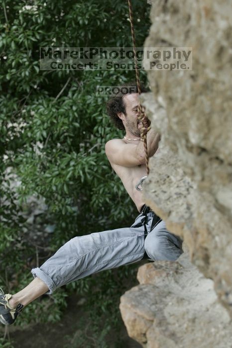 Jason Shear competing.  CTM hosted a speed climbing event at Seismic Wall on Diving for Rocks to benefit the Austin Area Food Bank, Saturday, May 9, 2009.

Filename: SRM_20090509_11213572.jpg
Aperture: f/5.0
Shutter Speed: 1/500
Body: Canon EOS-1D Mark II
Lens: Canon EF 80-200mm f/2.8 L