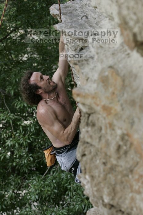 Jason Shear competing.  CTM hosted a speed climbing event at Seismic Wall on Diving for Rocks to benefit the Austin Area Food Bank, Saturday, May 9, 2009.

Filename: SRM_20090509_11214285.jpg
Aperture: f/5.0
Shutter Speed: 1/500
Body: Canon EOS-1D Mark II
Lens: Canon EF 80-200mm f/2.8 L