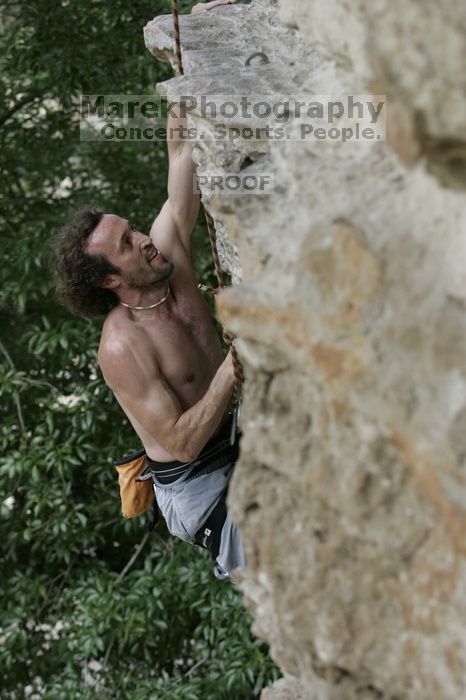 Jason Shear competing.  CTM hosted a speed climbing event at Seismic Wall on Diving for Rocks to benefit the Austin Area Food Bank, Saturday, May 9, 2009.

Filename: SRM_20090509_11214286.jpg
Aperture: f/5.0
Shutter Speed: 1/500
Body: Canon EOS-1D Mark II
Lens: Canon EF 80-200mm f/2.8 L