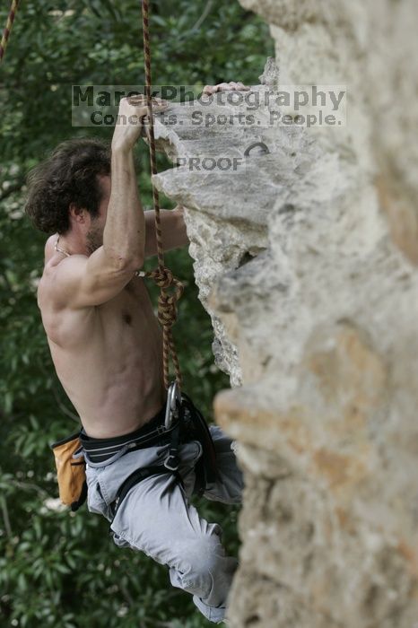 Jason Shear competing.  CTM hosted a speed climbing event at Seismic Wall on Diving for Rocks to benefit the Austin Area Food Bank, Saturday, May 9, 2009.

Filename: SRM_20090509_11214488.jpg
Aperture: f/5.0
Shutter Speed: 1/500
Body: Canon EOS-1D Mark II
Lens: Canon EF 80-200mm f/2.8 L