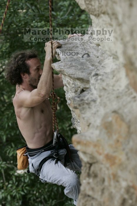 Jason Shear competing.  CTM hosted a speed climbing event at Seismic Wall on Diving for Rocks to benefit the Austin Area Food Bank, Saturday, May 9, 2009.

Filename: SRM_20090509_11214489.jpg
Aperture: f/5.0
Shutter Speed: 1/500
Body: Canon EOS-1D Mark II
Lens: Canon EF 80-200mm f/2.8 L