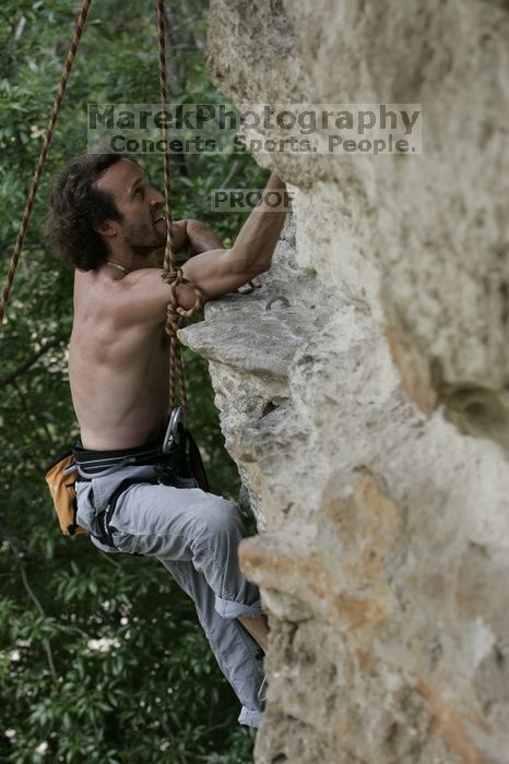 Jason Shear competing.  CTM hosted a speed climbing event at Seismic Wall on Diving for Rocks to benefit the Austin Area Food Bank, Saturday, May 9, 2009.

Filename: SRM_20090509_11214999.jpg
Aperture: f/5.6
Shutter Speed: 1/400
Body: Canon EOS-1D Mark II
Lens: Canon EF 80-200mm f/2.8 L