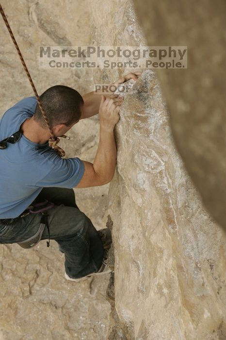 Sean O'Grady climbs in just running shoes.  CTM hosted a speed climbing event at Seismic Wall on Diving for Rocks to benefit the Austin Area Food Bank, Saturday, May 9, 2009.

Filename: SRM_20090509_11312287.jpg
Aperture: f/5.6
Shutter Speed: 1/1250
Body: Canon EOS-1D Mark II
Lens: Canon EF 80-200mm f/2.8 L