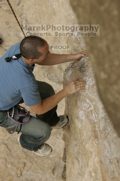 Sean O'Grady climbs in just running shoes.  CTM hosted a speed climbing event at Seismic Wall on Diving for Rocks to benefit the Austin Area Food Bank, Saturday, May 9, 2009.

Filename: SRM_20090509_11312491.jpg
Aperture: f/5.6
Shutter Speed: 1/1250
Body: Canon EOS-1D Mark II
Lens: Canon EF 80-200mm f/2.8 L