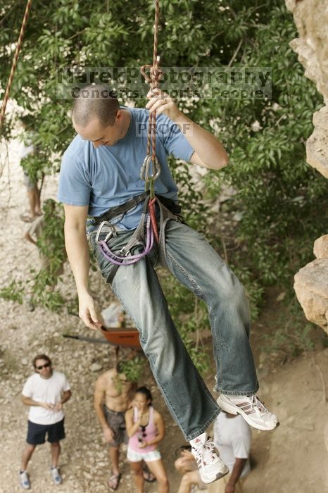 Sean O'Grady climbs in just running shoes.  CTM hosted a speed climbing event at Seismic Wall on Diving for Rocks to benefit the Austin Area Food Bank, Saturday, May 9, 2009.

Filename: SRM_20090509_11321337.jpg
Aperture: f/5.6
Shutter Speed: 1/250
Body: Canon EOS-1D Mark II
Lens: Canon EF 80-200mm f/2.8 L