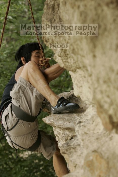 Long Ta, winner of the speed competition with a time of 15.33 seconds.  CTM hosted a speed climbing event at Seismic Wall on Diving for Rocks to benefit the Austin Area Food Bank, Saturday, May 9, 2009.

Filename: SRM_20090509_11333353.jpg
Aperture: f/5.6
Shutter Speed: 1/400
Body: Canon EOS-1D Mark II
Lens: Canon EF 80-200mm f/2.8 L