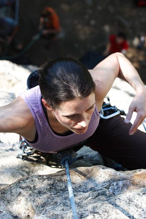 Beth Marek top rope climbing Roo Dog (5.8), taken from the anchors of the route.  It was Beth's third time outside, and another long day of rock climbing at Seismic Wall on Austin's Barton Creek Greenbelt, Monday, May 25, 2009.

Filename: SRM_20090525_09530204.JPG
Aperture: f/5.6
Shutter Speed: 1/200
Body: Canon EOS-1D Mark II
Lens: Canon EF 80-200mm f/2.8 L