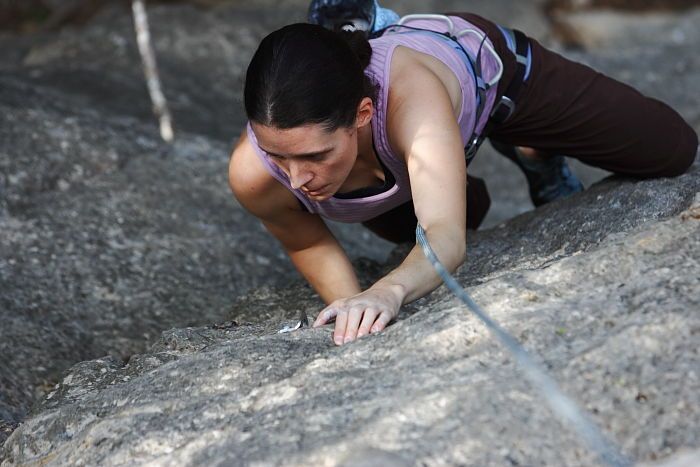 Beth Marek top rope climbing Hollywood (5.7), taken from the anchors of the route.  It was Beth's third time outside, and another long day of rock climbing at Seismic Wall on Austin's Barton Creek Greenbelt, Monday, May 25, 2009.

Filename: SRM_20090525_10390129.JPG
Aperture: f/4.0
Shutter Speed: 1/400
Body: Canon EOS-1D Mark II
Lens: Canon EF 80-200mm f/2.8 L