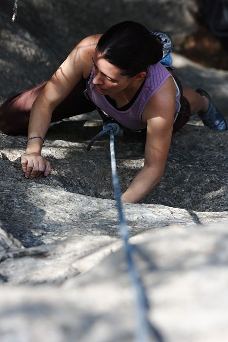 Beth Marek top rope climbing Hollywood (5.7), taken from the anchors of the route.  It was Beth's third time outside, and another long day of rock climbing at Seismic Wall on Austin's Barton Creek Greenbelt, Monday, May 25, 2009.

Filename: SRM_20090525_10394951.JPG
Aperture: f/5.6
Shutter Speed: 1/500
Body: Canon EOS-1D Mark II
Lens: Canon EF 80-200mm f/2.8 L