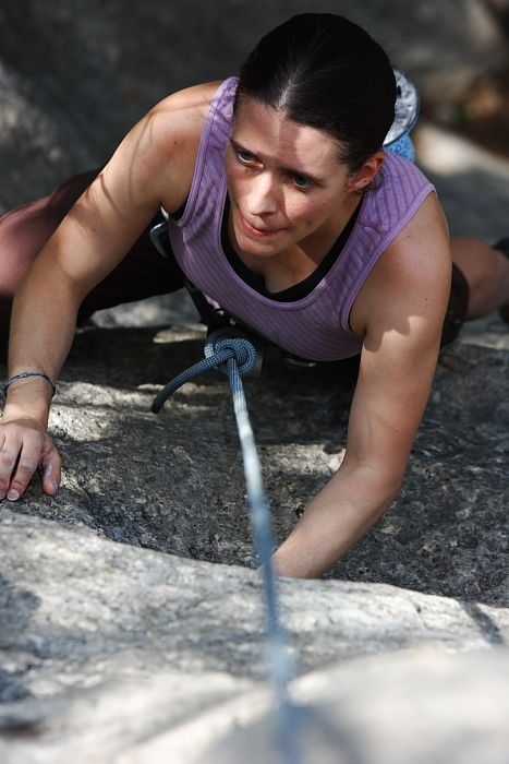 Beth Marek top rope climbing Hollywood (5.7), taken from the anchors of the route.  It was Beth's third time outside, and another long day of rock climbing at Seismic Wall on Austin's Barton Creek Greenbelt, Monday, May 25, 2009.

Filename: SRM_20090525_10395054.JPG
Aperture: f/5.6
Shutter Speed: 1/400
Body: Canon EOS-1D Mark II
Lens: Canon EF 80-200mm f/2.8 L