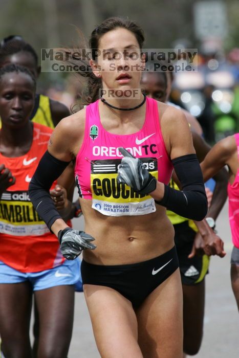 Kara Goucher was the third female to cross the finish line with a time of 2:32:25.  The 113th Boston Marathon took place on Monday, April 20, 2009.

Filename: SRM_20090420_10333899.JPG
Aperture: f/8.0
Shutter Speed: 1/800
Body: Canon EOS-1D Mark II
Lens: Canon EF 100-400mm f/4.5-5.6 L IS USM