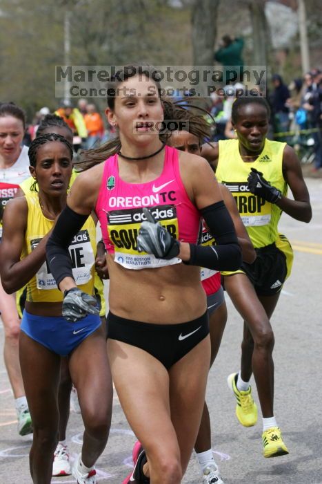 Kara Goucher was the third female to cross the finish line with a time of 2:32:25.  The 113th Boston Marathon took place on Monday, April 20, 2009.

Filename: SRM_20090420_10333903.JPG
Aperture: f/8.0
Shutter Speed: 1/640
Body: Canon EOS-1D Mark II
Lens: Canon EF 100-400mm f/4.5-5.6 L IS USM