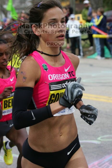 Kara Goucher was the third female to cross the finish line with a time of 2:32:25.  The 113th Boston Marathon took place on Monday, April 20, 2009.

Filename: SRM_20090420_10334008.JPG
Aperture: f/8.0
Shutter Speed: 1/800
Body: Canon EOS-1D Mark II
Lens: Canon EF 100-400mm f/4.5-5.6 L IS USM