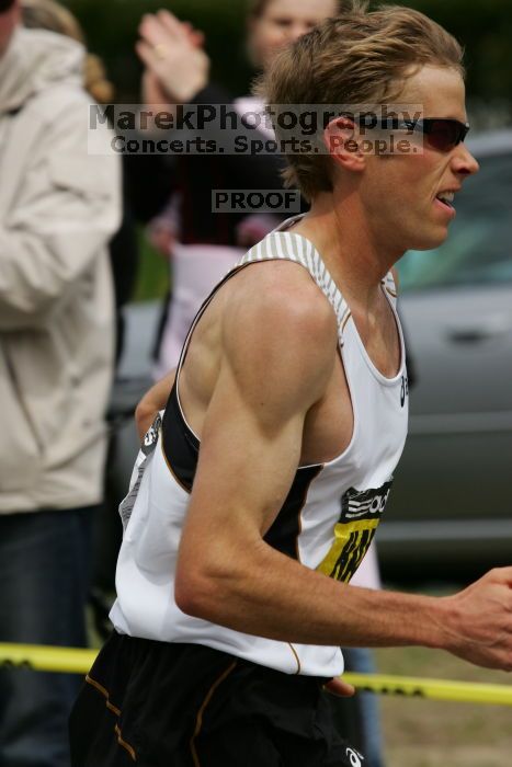 Ryan Hall was third to cross the finish line with a time of 2:09:40.  The 113th Boston Marathon took place on Monday, April 20, 2009.

Filename: SRM_20090420_10402145.JPG
Aperture: f/8.0
Shutter Speed: 1/1250
Body: Canon EOS-1D Mark II
Lens: Canon EF 100-400mm f/4.5-5.6 L IS USM