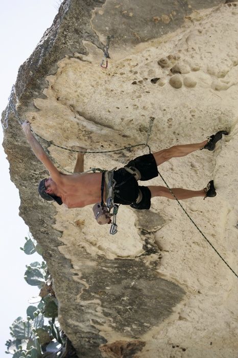 Tyler climbing Lonsome Dove (5.12), the roof above Diving for Rocks.  It was another long day of rock climbing at Seismic Wall on Austin's Barton Creek Greenbelt, Sunday, June 7, 2009.

Filename: SRM_20090607_13443603.jpg
Aperture: f/4.0
Shutter Speed: 1/500
Body: Canon EOS-1D Mark II
Lens: Canon EF 80-200mm f/2.8 L