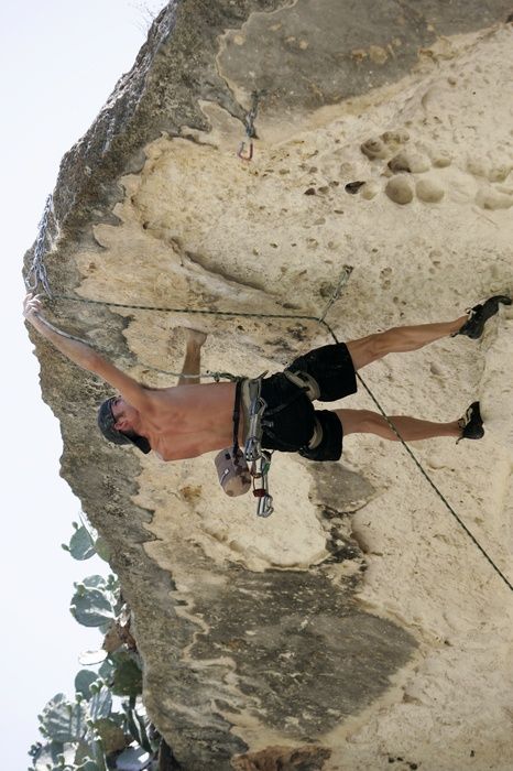 Tyler climbing Lonsome Dove (5.12), the roof above Diving for Rocks.  It was another long day of rock climbing at Seismic Wall on Austin's Barton Creek Greenbelt, Sunday, June 7, 2009.

Filename: SRM_20090607_13443704.jpg
Aperture: f/4.0
Shutter Speed: 1/500
Body: Canon EOS-1D Mark II
Lens: Canon EF 80-200mm f/2.8 L