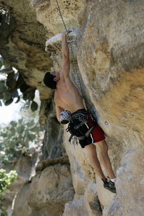 Chris Bottaro on Diving for Rocks (5.10d).  It was another long day of rock climbing at Seismic Wall on Austin's Barton Creek Greenbelt, Sunday, June 090607, 2009.

Filename: SRM_20090607_13544011.jpg
Aperture: f/4.0
Shutter Speed: 1/500
Body: Canon EOS-1D Mark II
Lens: Canon EF 80-200mm f/2.8 L