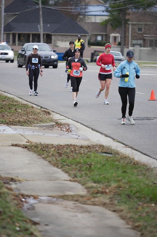 Beth Marek running the Rocket City Marathon on Saturday, December 12, 2009 in Huntsville.

Filename: SRM_20091212_12021519.JPG
Aperture: f/2.8
Shutter Speed: 1/800
Body: Canon EOS-1D Mark II
Lens: Canon EF 80-200mm f/2.8 L