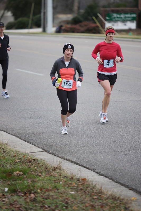 Beth Marek running the Rocket City Marathon on Saturday, December 12, 2009 in Huntsville.

Filename: SRM_20091212_12022121.JPG
Aperture: f/2.8
Shutter Speed: 1/800
Body: Canon EOS-1D Mark II
Lens: Canon EF 80-200mm f/2.8 L