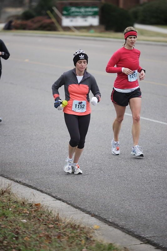 Beth Marek running the Rocket City Marathon on Saturday, December 12, 2009 in Huntsville.

Filename: SRM_20091212_12022325.JPG
Aperture: f/2.8
Shutter Speed: 1/800
Body: Canon EOS-1D Mark II
Lens: Canon EF 80-200mm f/2.8 L